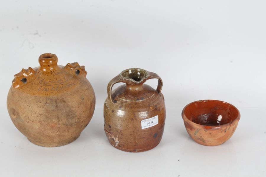 19th century stoneware jug, with a brown speckled glazed bulbous body and twin handles together with