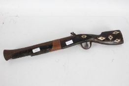 20th century Indian blunderbuss, with bone lozenges decorating the stock, 63cm long