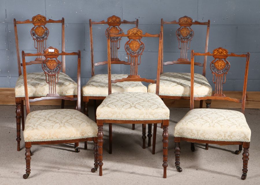 Set of six Edwardian chairs, with an arched pediment with a pierced back with marquetry inlaid of