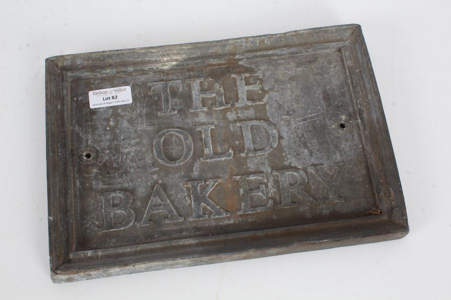 Old lead shop sign "The Old Bakery", of rectangular form, 27.5cm, 19cm