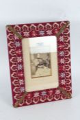 Late Victorian/ Edwardian felt and embroidered photograph frame, housing a photo of a seated lady,