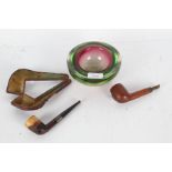 Two pipes and a glass ash tray, Kiko 63 pipe together with another with a silver band housed