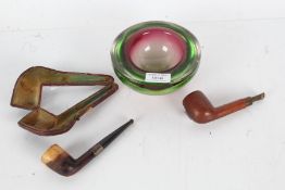 Two pipes and a glass ash tray, Kiko 63 pipe together with another with a silver band housed