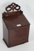 George III candle box, , possibly chestnut, the pierced top above a sloped hinged compartment, the