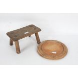 Small four legged milking stool, and a circular bread board (2)