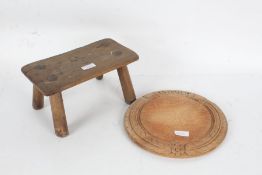 Small four legged milking stool, and a circular bread board (2)