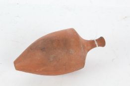 Etruscan style terracotta bottle, the flared slender neck above a bulbous tapering body, 16cm high