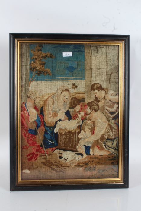 Victorian wool work embroidery, study of a religious scene, housed in an ebonised and glazed