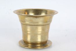 19th/20th century brass mortar of typical form, 9cm high