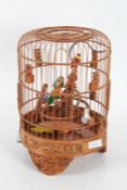 20th century Chinese birdcage with wooden parrots inside the cage and base decorated with Chinese