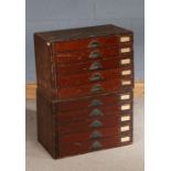 Pair of 20th century filing cabinets each with five long draws and shell handles, 59cm wide 40cm