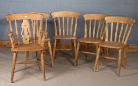 Five beech slat back kitchen chairs, to include one carver and four standard (5)