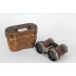 Pair of 20th century Le Jockey Club of Paris binoculars housed within a leather case