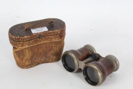 Pair of 20th century Le Jockey Club of Paris binoculars housed within a leather case