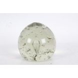 A Victorian glass "end of day" paperweight, with interior bubble decoration, 12cm diameter