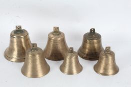 Six base metal bells, three with numbers (6)