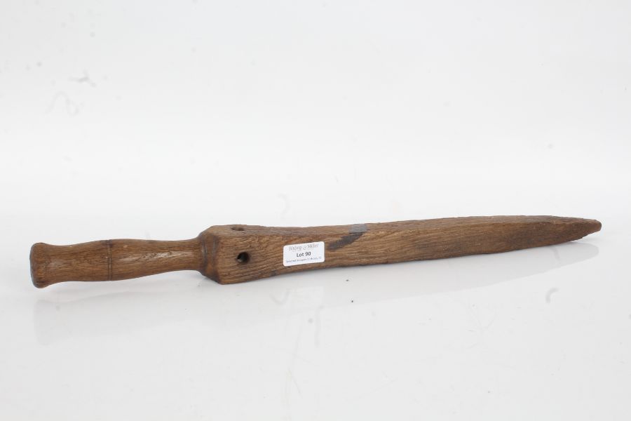 19th century treen strickle, 51cm long (these were hung from the waist and smeared with grease and