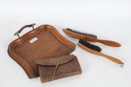 Wooden crumb tray with two brushes and a leather wallet housing early 20th century remembrance