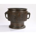 Chinese bronze censer, Qing dynasty, 19th Century, with elephant mask handles and eight panels