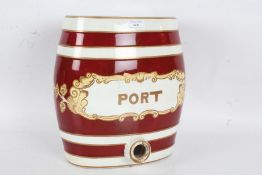 Large early 20th century ceramic pun barrel "Port", with maroon bands on a white ground, 27cm