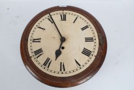 20th century oak cased wall clock of circular form with a white dial and Roman numerals, 39cm