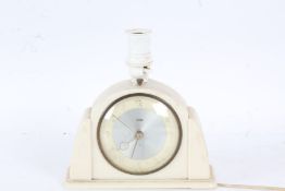 Art Deco Metamec bakelite mantel clock/lamp, having shaped white case, the dial with arabic