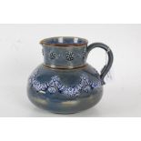 Doulton Lambeth jug, the blue ground with floral garland decoration, 16cm high