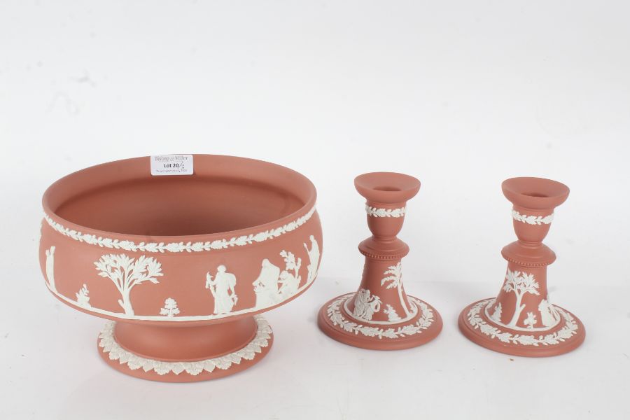 Wedgwood terracotta pedestal bowl, 20cm diameter, together with a pair of candlesticks, 12.5cm tall,
