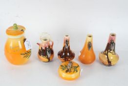 Collection of French mid 20th century porcelain in bright orange decorated with Cicadas to include