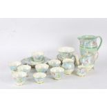 Shelley "Melody" part teaset, comprising teapot, two cream jugs,one large jug, two sugar bowls,