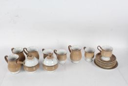 Quantity of Denby mugs and saucers, and two lidded preserve pots (qty)