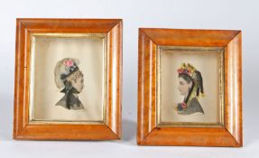 Pair of 19th Century decoupage portraits, depicting two ladies in profile with foliate decorated