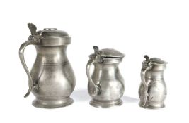 Three pewter Imperial Scottish baluster measures, circa 1830 To include a Glasgow pint; an Edinburgh