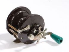 Penn No.85 multiplier fishing reel, the brown bakelite body with white metal fittings and green