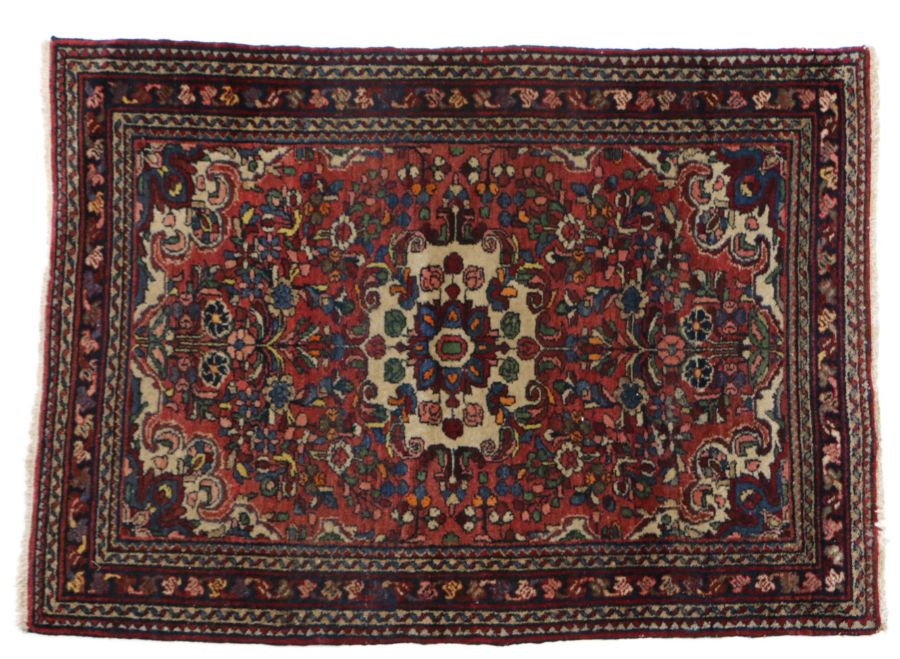 Persian Zaronim Hamadan rug, centred with a flower head within a floral pattern on red ground, 150cm