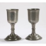 Pair of late 19th Century pewter goblets, the bowls with flared rims above knopped stems and domed