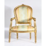 Continental gilt wood armchair the arched back with pad back above a stuff over seat flanked by