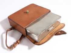 Early 20th Century sandwich tin, the tin with double hinge, housed in a brown leather travelling