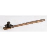 Victorian oak and iron cellar candle holder, the tapering handle with iron candlestick to the