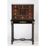 An Antwerp ebonised, ripple moulded and tortoise shell cabinet on stand, the gilt metal gallery