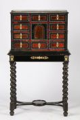 An Antwerp ebonised, ripple moulded and tortoise shell cabinet on stand, the gilt metal gallery