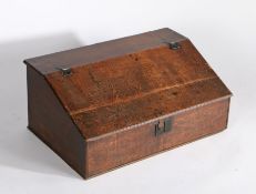 18th Century oak desk box, the sloping fall opening to reveal storage space above the panel base,