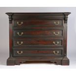 18th Century Italian ebonised walnut commode, the rectangular top with projecting corbels above four