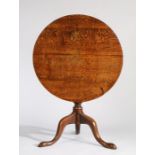 George III oak occasional table, the circular top above a turned column and cabriole legs, 72cm
