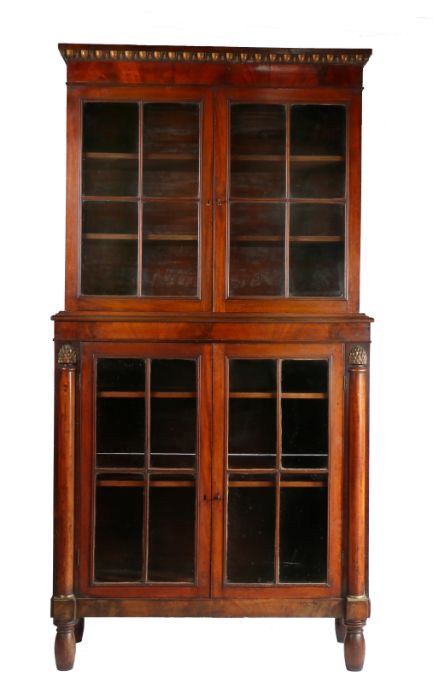 19th Century mahogany bookcase, the top section with a pair of astragal glazed doors enclosing