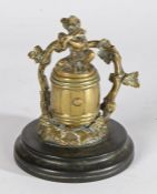 19th Century novelty brass inkwell and pen stand, the inkwell modelled as a bear playing a violin