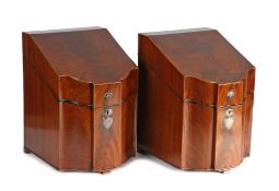 Pair of Regency mahogany knife boxes, the sloping hinged lids opening to reveal a fitted interior