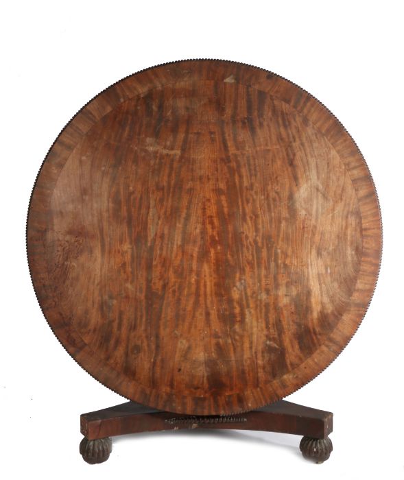 William IV mahogany breakfast table, in the manner of Gillows, the circular snap top with cross band