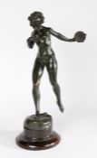 Late 19th Century bronze by Lina Muller, depicting a dancing nude lady holding a tambourine in her