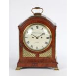 George III mahogany mantel clock, Dwerrihouse & Carter, London, the arched caddy top with brass
